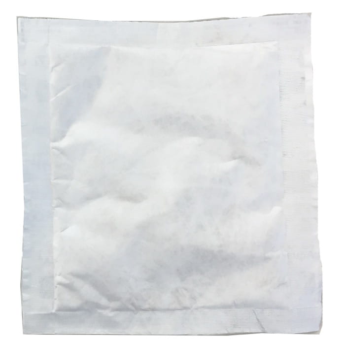 Non-woven film side of the sachet